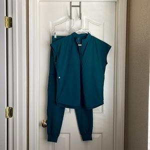 XXS FIONLITE Caribbean Blue Scrub Top & XS FIONLITE Caribbean Blue Scrub Pants.